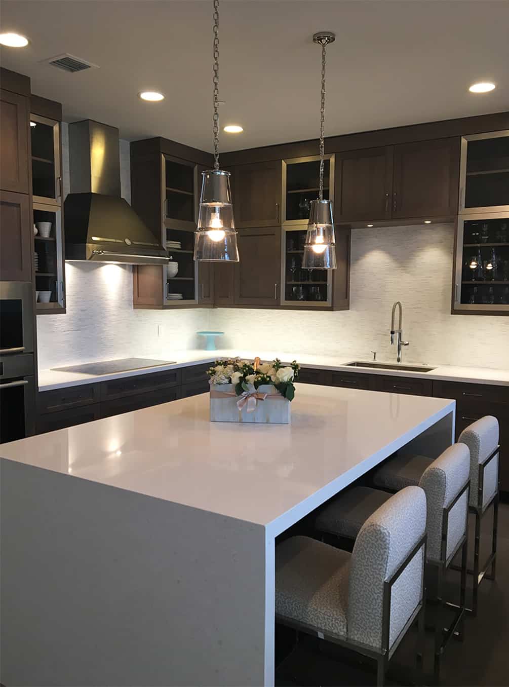 dark-cabinet-kitchen-with-quartz-counters