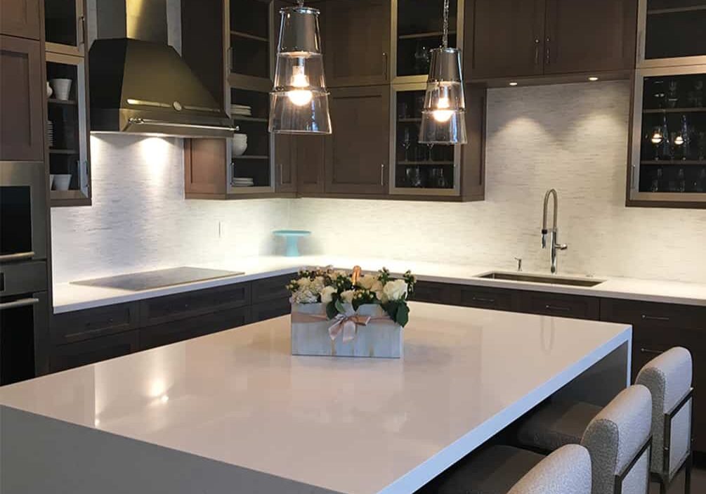 dark-cabinet-kitchen-with-quartz-counters